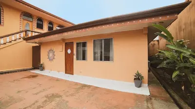a house with a door and a courtyard at Fortuna Flat Walk & Value in Fortuna