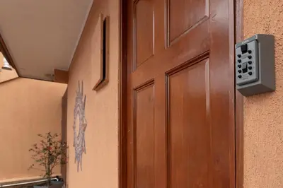 a wooden door with a speaker on a wall at Oasis 17 , Group Getaway in Fortuna