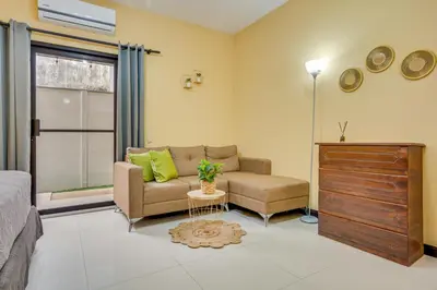 a living room with a couch and a table at Casa Luna in Carpintero