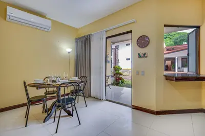 a dining room with a table and chairs at Casa Luna in Carpintero
