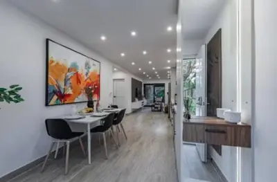 a kitchen and dining room with a table and chairs at Luxury 2BR Villa by Tamarindo, AC, Private Yard in Tamarindo