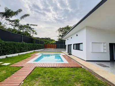 a swimming pool in the backyard of a house at CASA CEA-Swimming Pool Rancho SantaTeresa Malpais in San Isidro