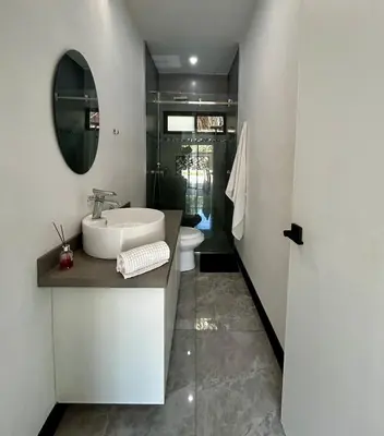 a bathroom with a sink and a toilet at CASA CEA-Swimming Pool Rancho SantaTeresa Malpais in San Isidro