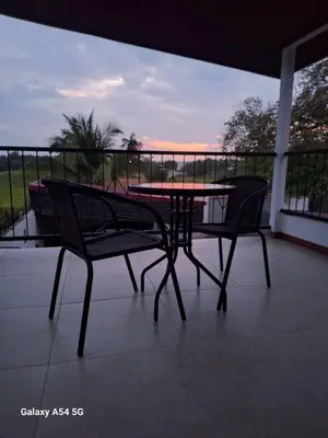 a table and two chairs on a balcony with a view at Apartamento Lantanas in Palma