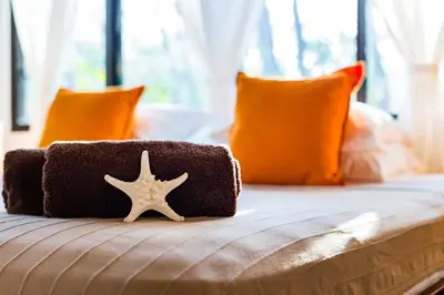 a starfish laying on top of a bed at Casa Rustica 1 in Playa Grande