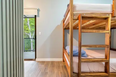 a bunk bed room with two bunk beds at Montedonato 18 - Combo in Playa Avellana