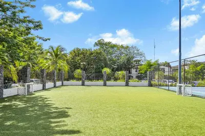 an empty soccer field with a goal at Sol Haven at Naumi, Pools, Gym & Beach Club in Sardinal