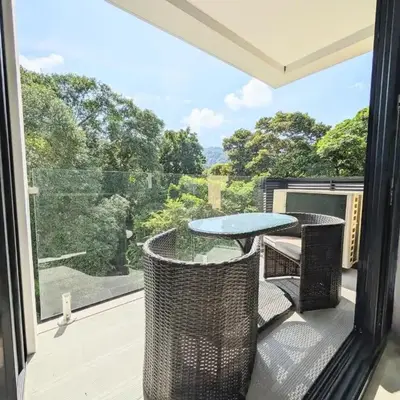 Torres del Mar rainforest-view two-bedroom condo