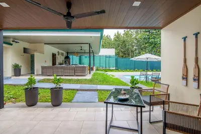 an outdoor patio with a table and chairs at Casa do Mar in Cebadilla