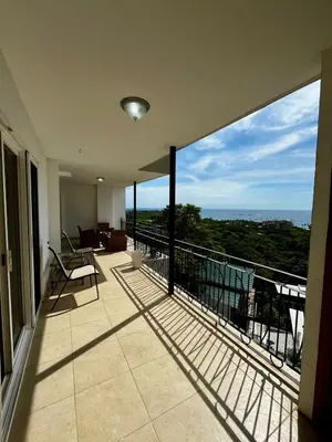 a balcony of a house with a view of the ocean at Mir3 Tamarindo 2BR Ocean View Retreat in Tamarindo