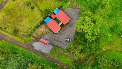 an overhead view of a car parked in a field at Refugio Las Cortezas in Tapantí
