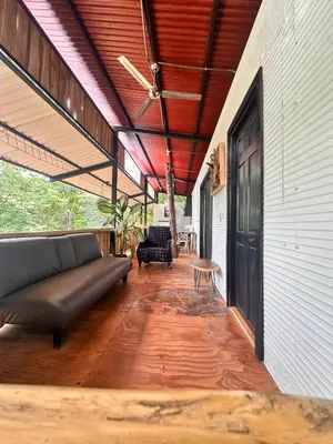 a living room with a couch and a table at Casa Laurel in Santa Cruz