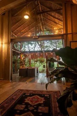 a large room with a large window and a rug at Unique design and cozy property in Playa Hermosa