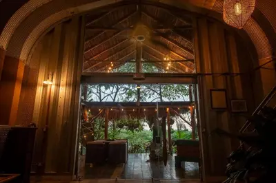 an entrance to a building with a large glass door at Unique design and cozy property in Playa Hermosa
