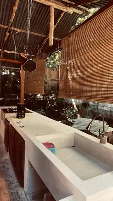 a kitchen with a sink and a counter top at Nagomi Casita #1 in Sámara