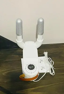 a music machine with two microphones on the floor at Kame House, Tortuguero in Tortuguero