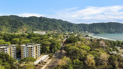 an aerial view of a city and the ocean at Heavenly View - 2 BDRM Oceanview Apartment in Jacó