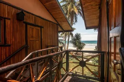 a view of the beach from a house balcony at Samara Treehouse Inn Unit 3 in Sámara