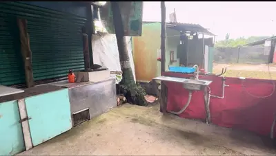 a bathroom with a sink in a building at Camping y hospedaje playa azul in Tarcoles