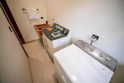 a small kitchen with a stove and a sink at Villa Alma Verde in Fortuna