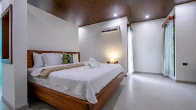 a bedroom with a large bed in a room at Villa Alma Verde in Fortuna