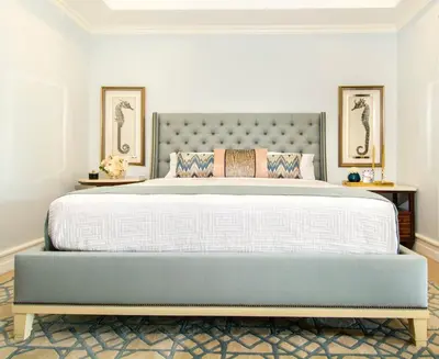 a bedroom with a large bed with two tables at Casa Serena Luxury Retreat in Reserva Conchal in Brasilito