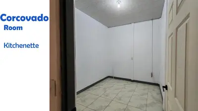 an empty room with a door and a tile floor at Aura Living in La Garita