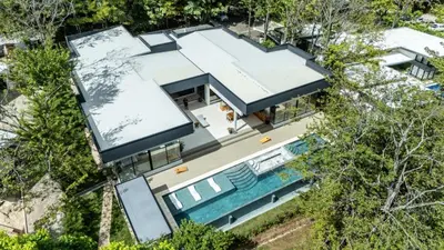 an overhead view of a house with a swimming pool at Casa McCash in Tamarindo
