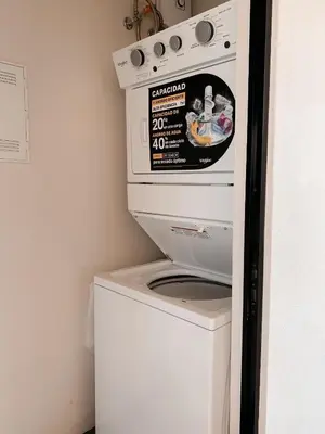 a washer and dryer in a small kitchen at Villas Vivo in Potrero