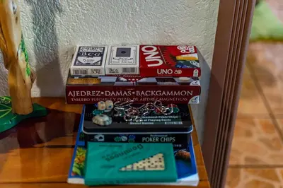a stack ofiger danish backgammon at Toucan River Paradise - River access, AC in Fortuna