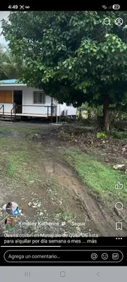 a picture of a house with a tree and a dirt road at Casita colibri in Savegre