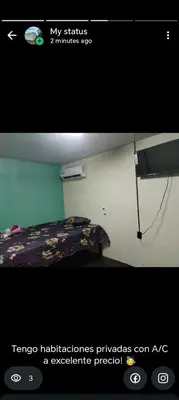 a picture of a bedroom with a bed in a room at Hostel La Bambú in Quepos