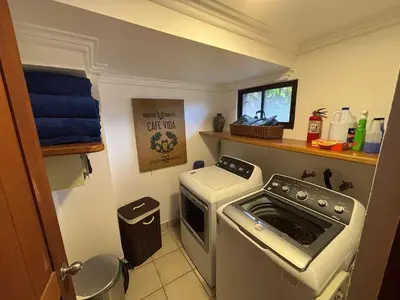 a small kitchen with a stove and a sink at Stunning Ocean View Villa in Playa Coco and Ocotal in Ocotal