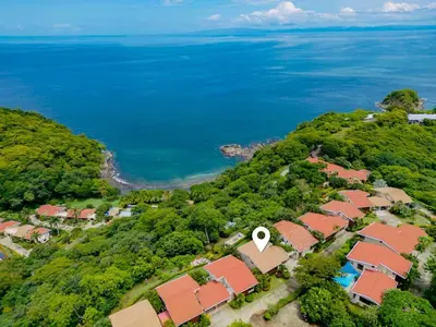 an aerial view of a community of houses next to the ocean at Stunning Ocean View Villa in Playa Coco and Ocotal in Ocotal