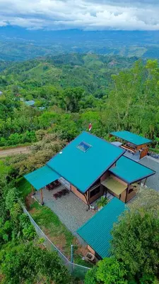 an overhead view of a building with blue roofs at Paraiso Terrenal Chalet in San Isidro
