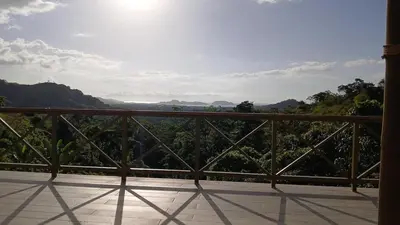 a balcony with a view of the mountains at Luxury villa Potrero in Potrero