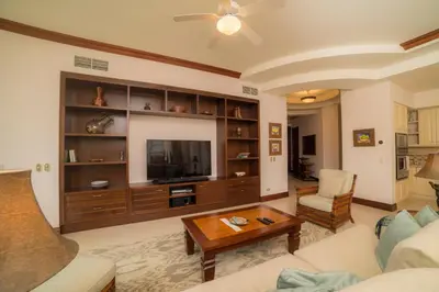 a living room with a couch and a tv at Bella Vista 2D 3 bdr 3 1 and half bath in La Mona