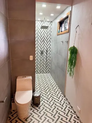 a bathroom with a toilet and a shower at Casa Adam in Pochote