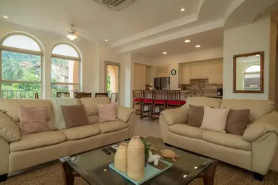 a living room with two couches and a table at Bella Vista 1C - 3 bdr - 3 1 and half bath in La Mona