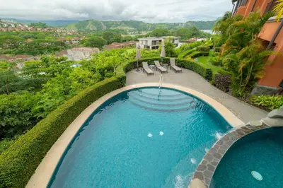 an overhead view of a swimming pool at a resort at Montebello 4E 3bed 3 bath in Jacó
