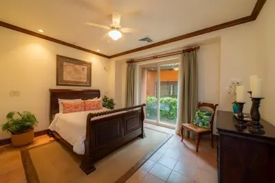 a bedroom with a large bed and a window at Montebello 4E 3bed 3 bath in Jacó