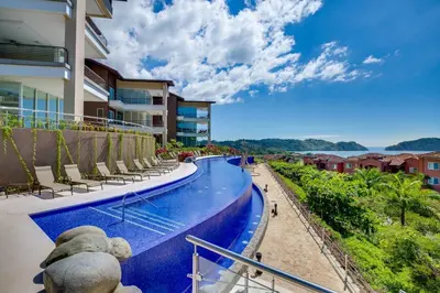 a view of a swimming pool at a resort at Montecielo 3E - 3 bdr 3 1 and a half bath Ocean View in La Mona
