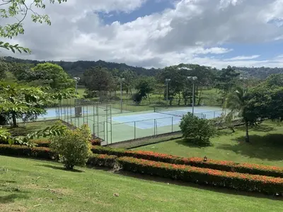 a tennis court in the middle of a park at Veranda 4B - 3bdr 3bath in La Mona