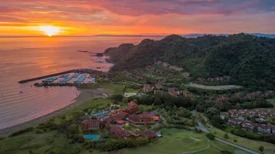 an aerial view of a resort on the beach at sunset at Veranda 6C - 3 bdr 3 bath in La Mona