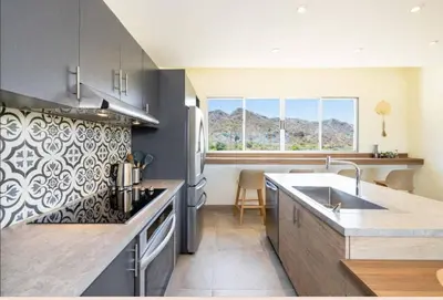 a kitchen with a sink and a counter top at Luxury villa Potrero in Potrero