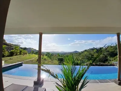 a view of a swimming pool from a house at Luxury villa Potrero in Potrero