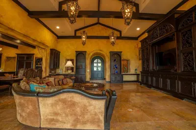 a living room with a couch in the middle of a room at Villa Angel 4 bdr Ocean View private pool Family in La Mona