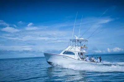 a group of people on a boat in the water at Villa Angel 4 bdr Ocean View private pool Family in La Mona
