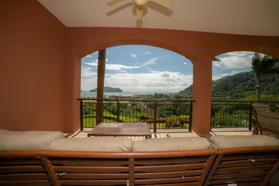 a room with a balcony with a large window at Altavista 2C 3 bdr 3 bath Ocean View in La Mona