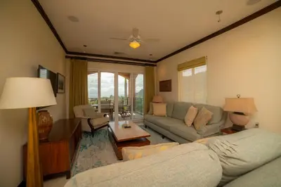 a living room with a couch and a table at Altavista 2C 3 bdr 3 bath Ocean View in La Mona